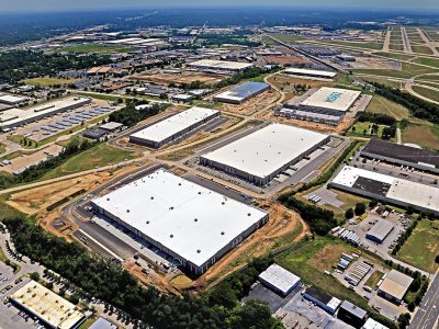 Look ENE at Hazelwood Logistics Center on Hazelwood Logistics Center Dr Hazelwood MO 63042 with Lambert International Airport KSTL in the background