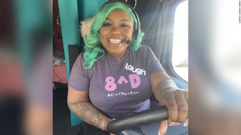 Clarissa Rankin behind the steering wheel in her truck.