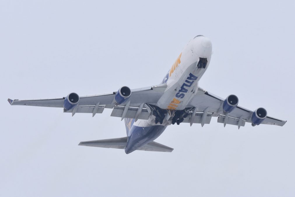 Photo of an Atlas Air plane in flight, taken from the ground
