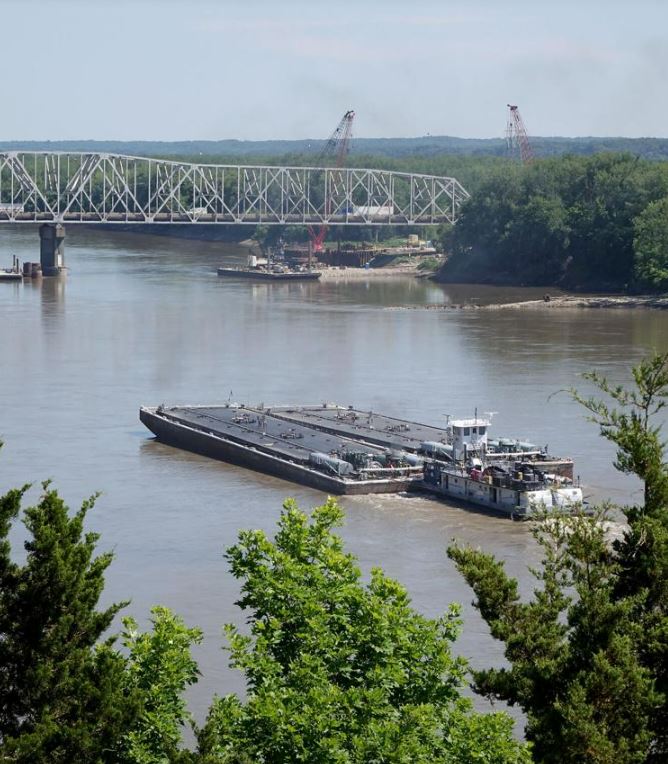 The tugboat Mr. Lampton moves along the Missouri River on June 27 at the Rocheport bridge.