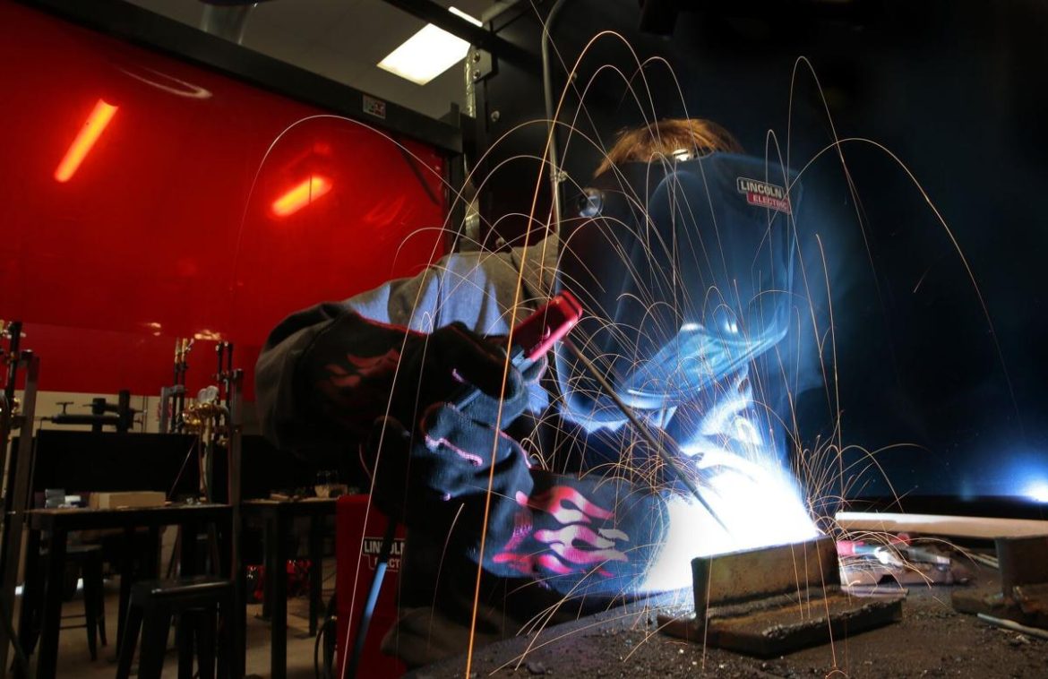 Ethan Koenig, 20, welds a steel T-joint at the Center for Workforce Innovation at St. Louis Community College.
