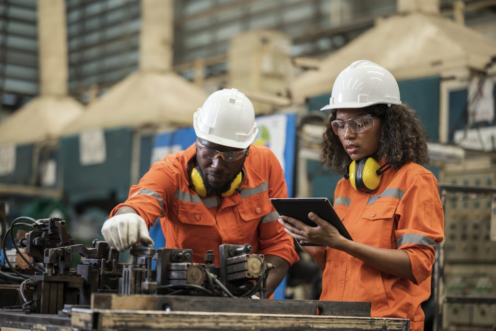 Two employees of a manufacturing company.