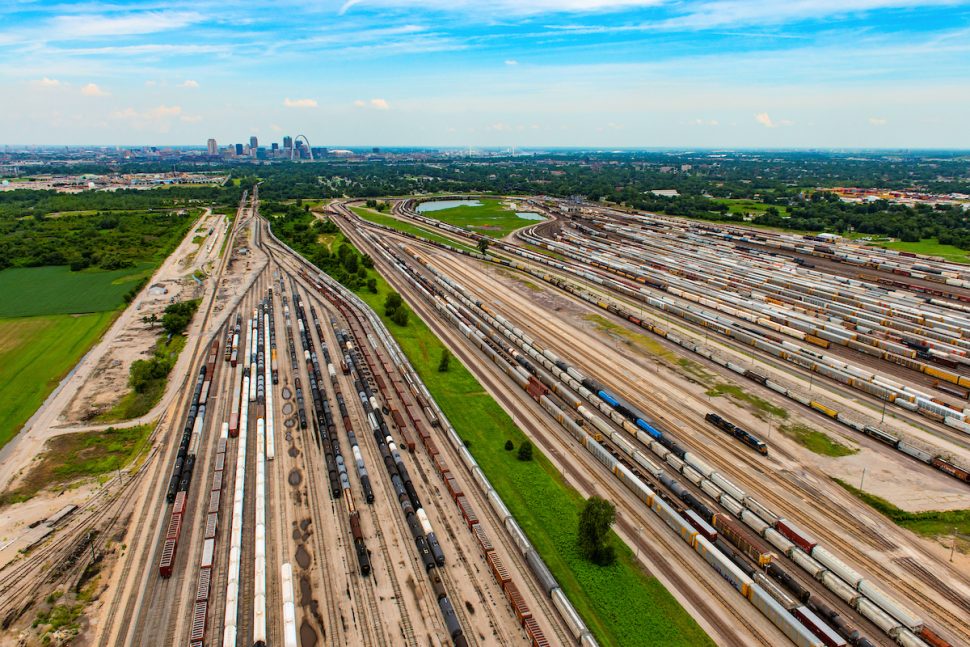freight train yard with st. louis in the background