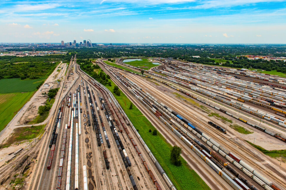 freight train yard with st. louis in the background