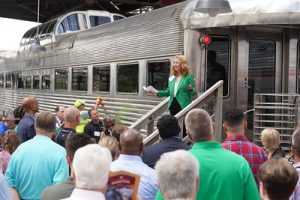 Executive Vice President of Multimodal Enterprises greeting audience of Rail Tour.